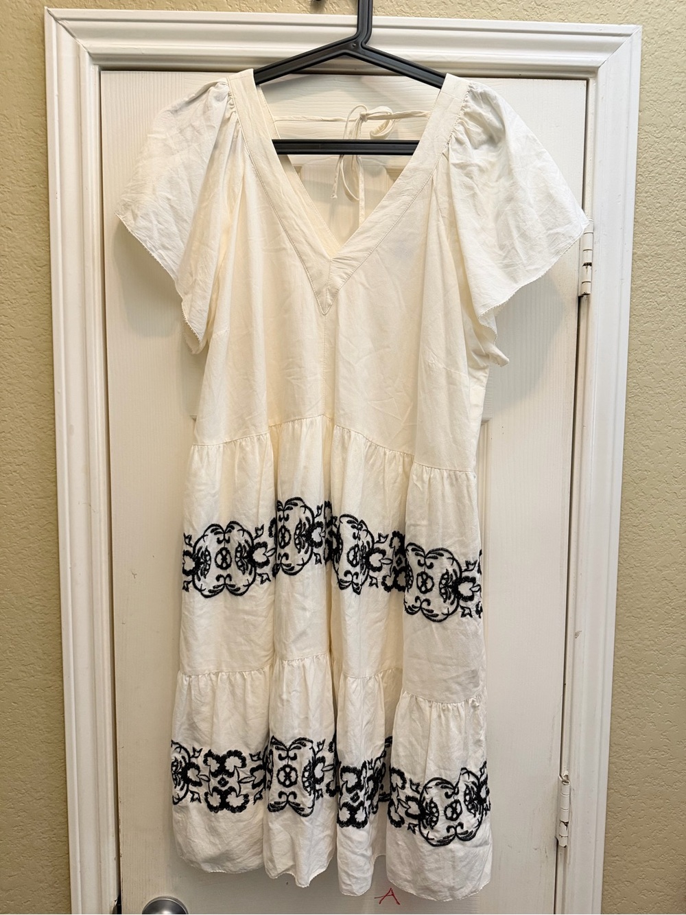 Old Navy Embroidered V-Neck Swing Dress featuring black embroidery